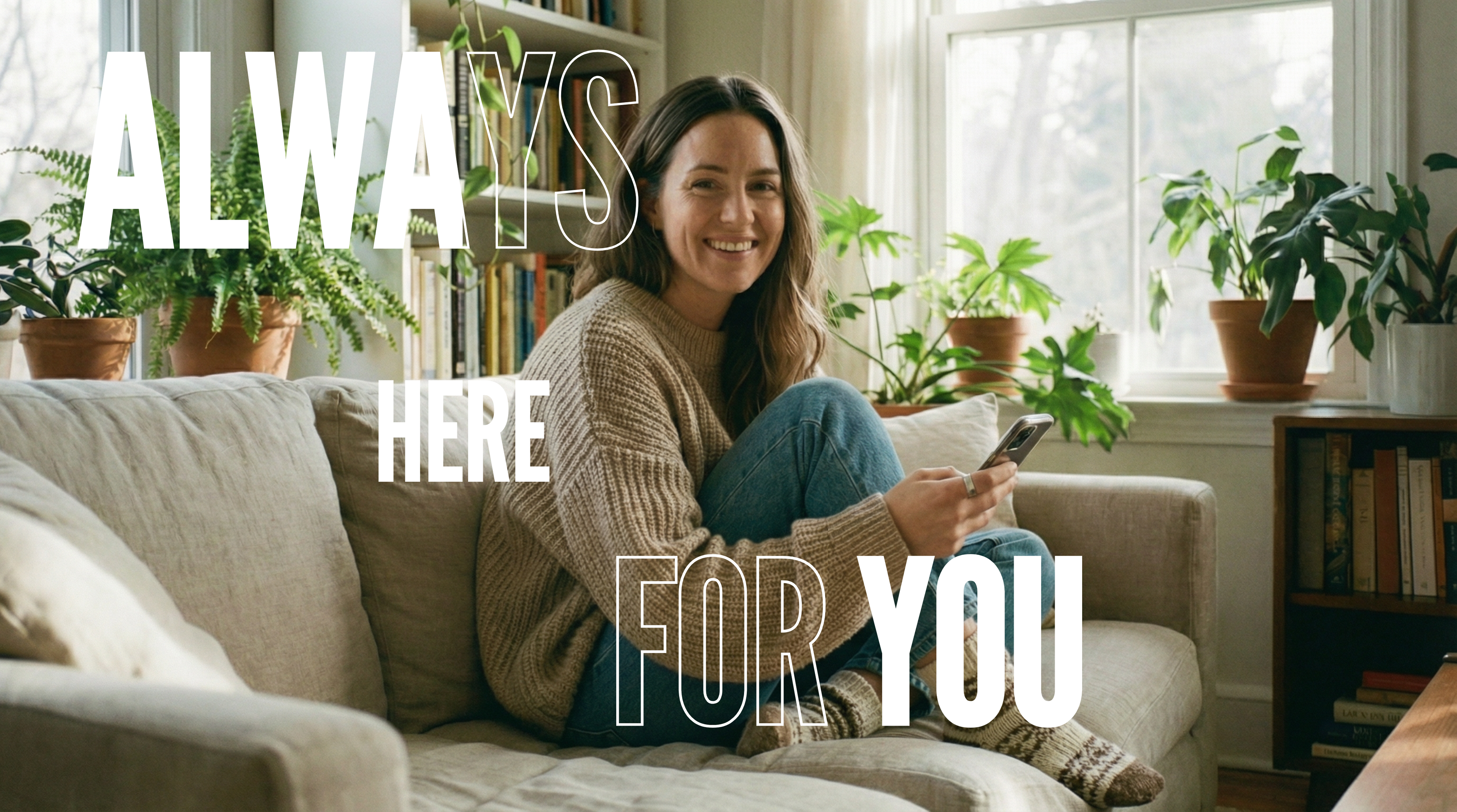 Smiling woman wearing Synora smart ring on sofa. Daily wellness companion, contact us section.