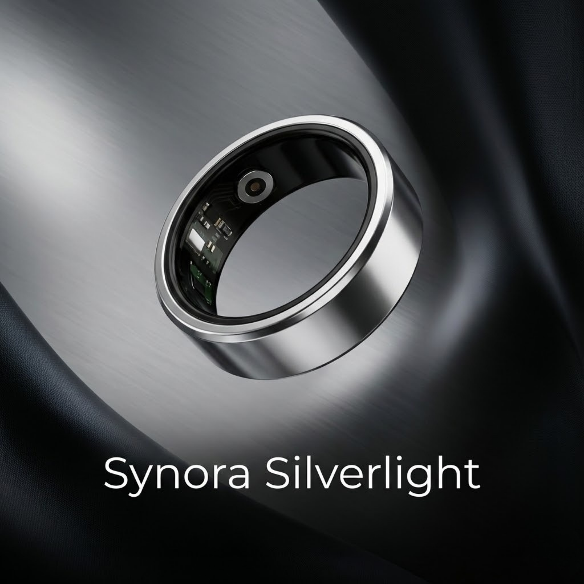 Close-up of Synora Silverlight smart ring showing polished silver finish and inner health tracking sensors. Elegant tech jewelry